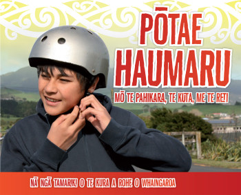 Book cover showing boy putting on bicycle helmet.