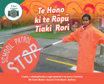 Book cover showing girl operating school patrol sign.