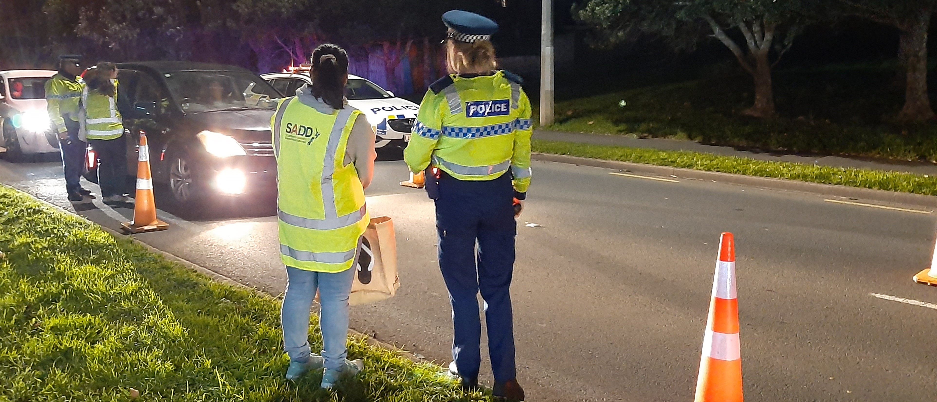 A SADD student attends a police checkpoint.